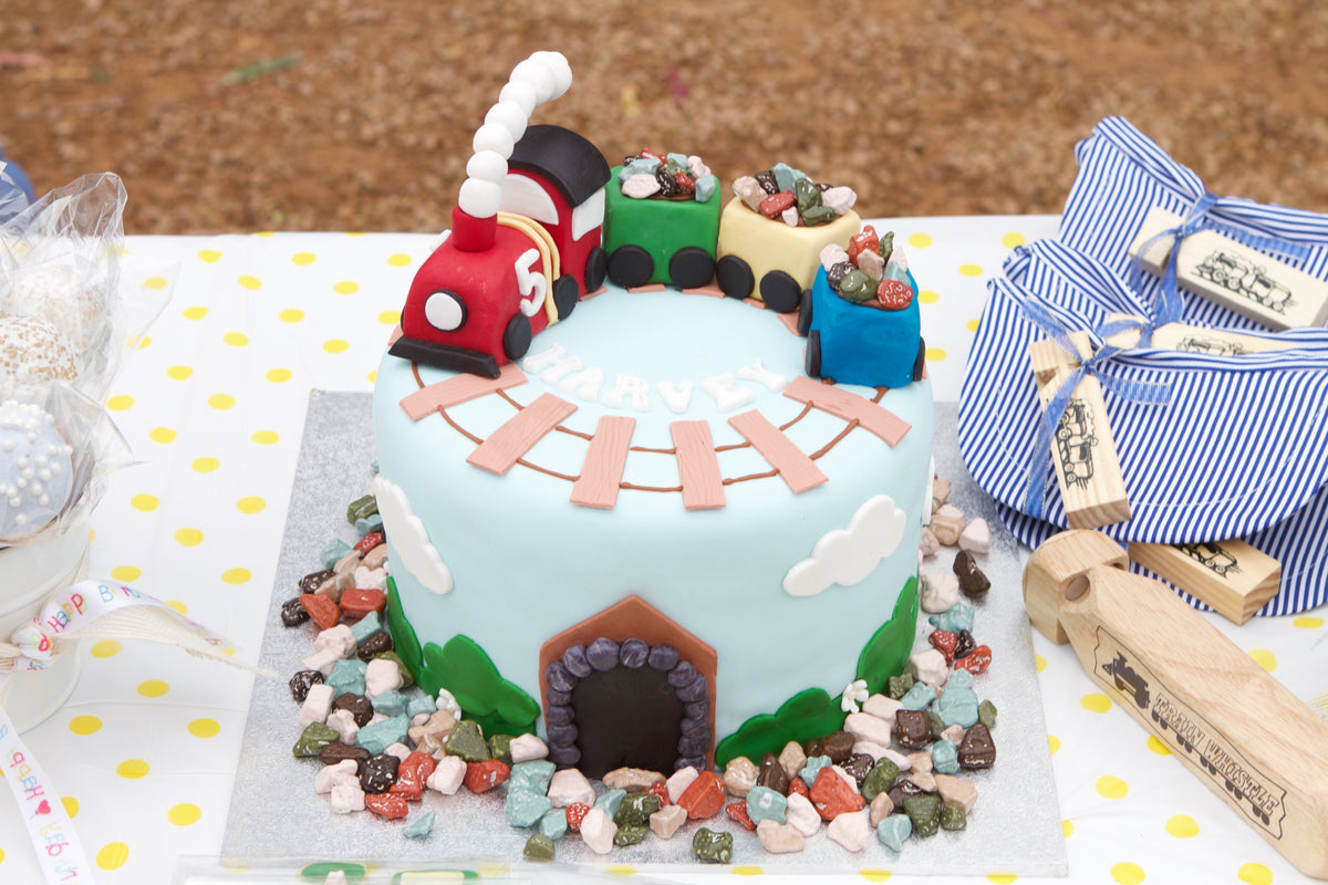 Train theme colorful customized cake for boy's 3rd - CakesDecor