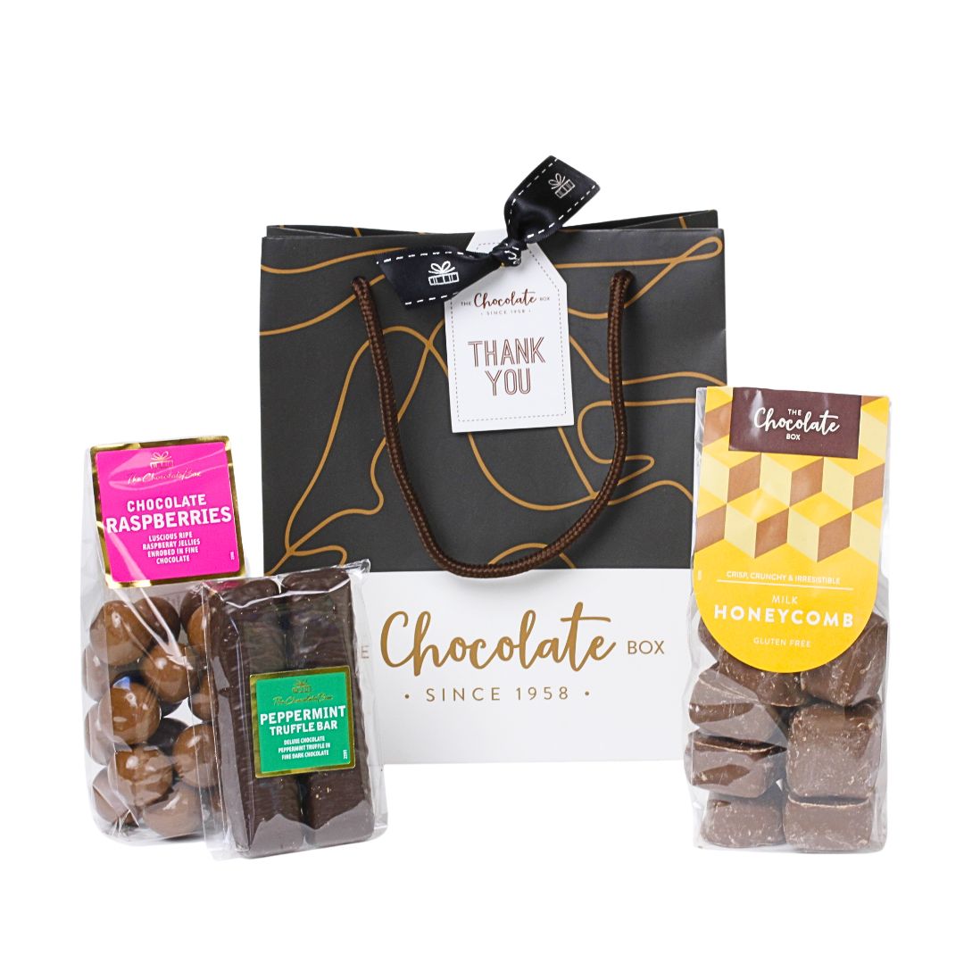 CHRISTMAS CHOCOLATE GIFT BAGS & HAMPERS