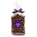 chocolate almonds gift bag tied with a purple ribbon