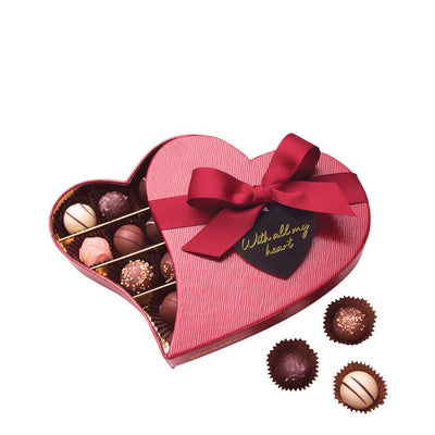 chocolate truffles in deep red heart shaped box with tag reading "with all my love"